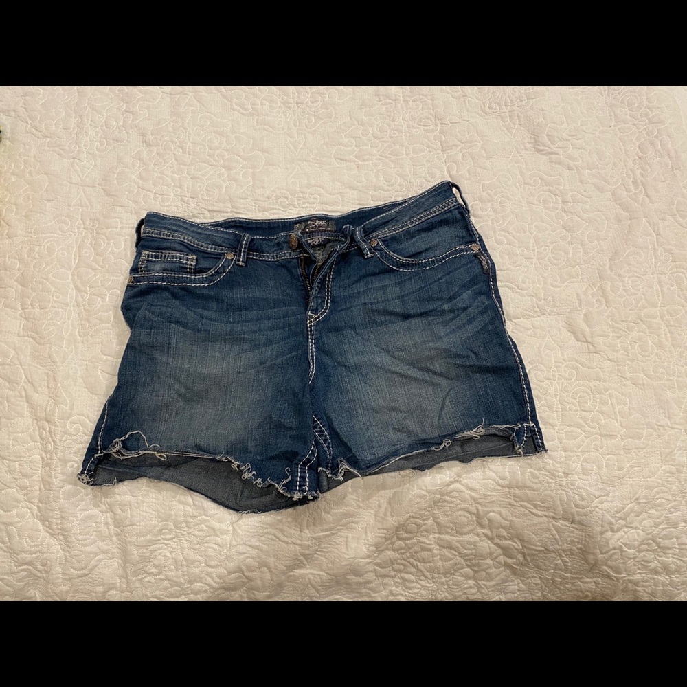 Silver shorts, distressed hem